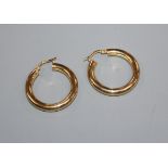 A pair of 18ct gold hoop earrings, 4 grams.