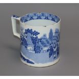 A blue and white pearlware mug height 12cm
