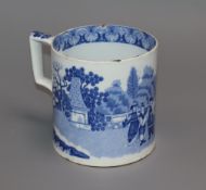 A blue and white pearlware mug height 12cm