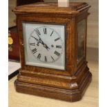 A Victorian oak mantel clock striking on gong height 34cm