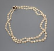 A double strand cultured pearl choker necklace with 9ct gem set clasp, 35cm.
