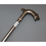 A 19th century bidri ware mahout elephant tamer's stick, with tiger's head handle and decorated with