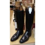 A pair of black leather riding boots, the trees bearing ivorine plaques inscribed 'Viscount