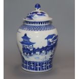 A 19th century Chinese blue and white vase and cover, Kangxi mark height 26cm