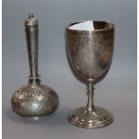 Two Indian white metal goblet and a similar bottle vase and cover, vase 17.2cm.