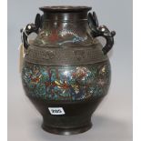 An Oriental bronze two handled champleve enamel vase
