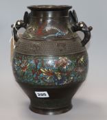 An Oriental bronze two handled champleve enamel vase