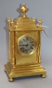 A French gilt brass mantel clock having silvered Roman dial height 36cm