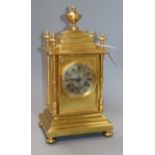 A French gilt brass mantel clock having silvered Roman dial height 36cm