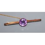 A 9ct and amethyst bar brooch, 51mm.