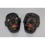 A pair of Japanese Noh masks height 19cm
