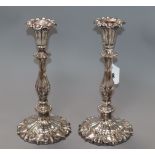 A pair of plated candlesticks height 29cm