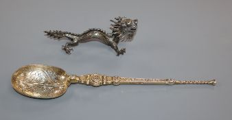 An Edwardian silver gilt replica anointing spoon, by Saunders & Shepherd, Chester, 1907 and a