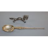 An Edwardian silver gilt replica anointing spoon, by Saunders & Shepherd, Chester, 1907 and a