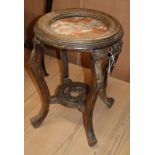 A Chinese marble topped jardiniere stand 35cm diameter