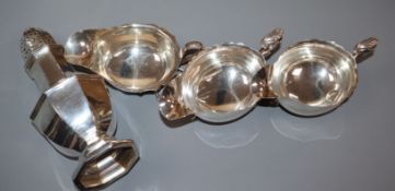 A pair of George V silver sauceboats, one other silver sauceboat and a silver sugar caster, 17.5