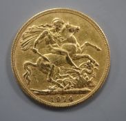 A George V 1914 gold full sovereign.