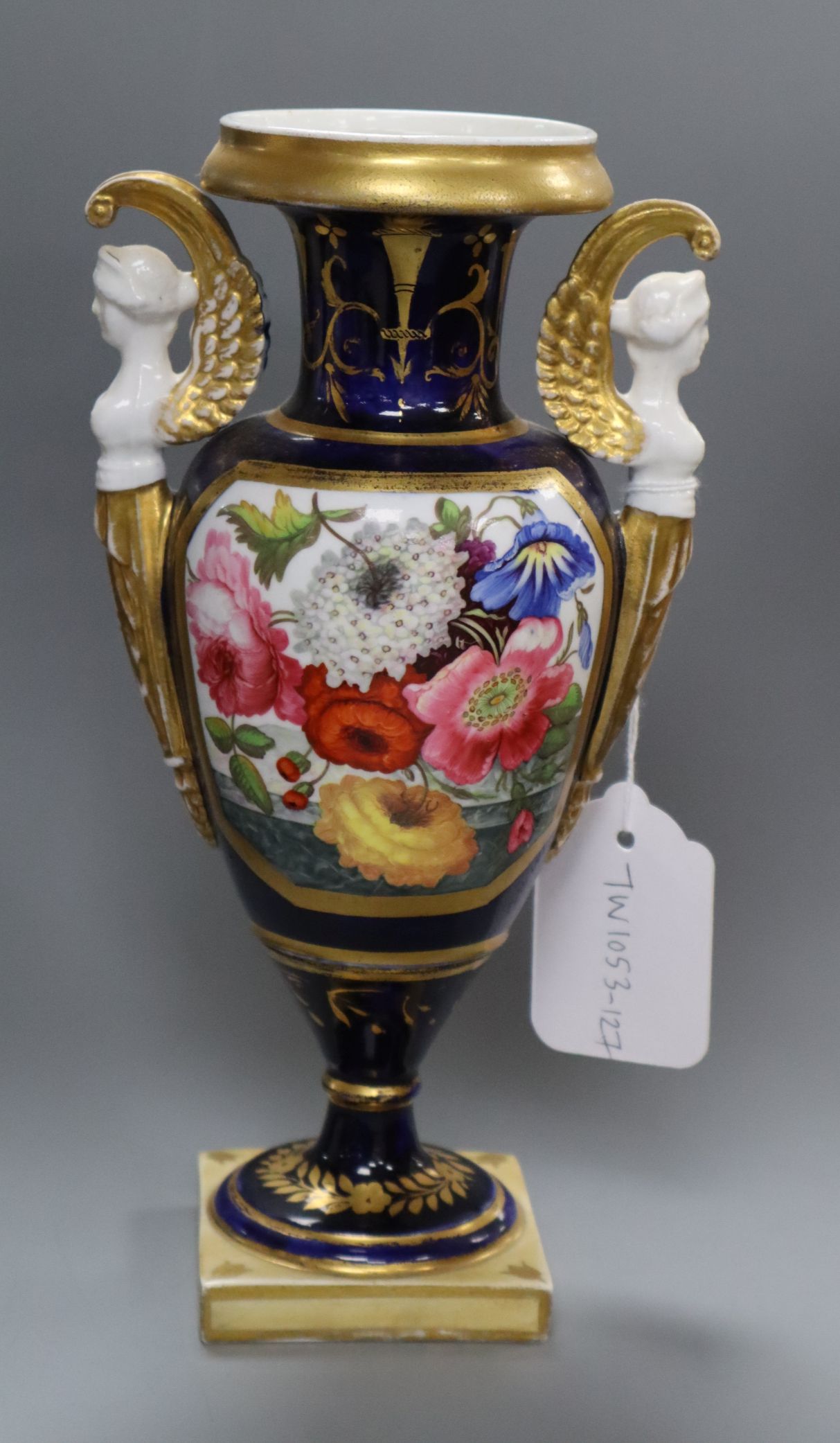 An English porcelain pedestal vase, c.1820, winged female bust handles