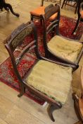 A pair of Regency brass inlaid beech dining chairs