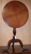 A George III and later mahogany circular tilt top tea table Diam.59cm