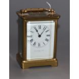 A Collingwood & Son retailed brass carriage timepiece