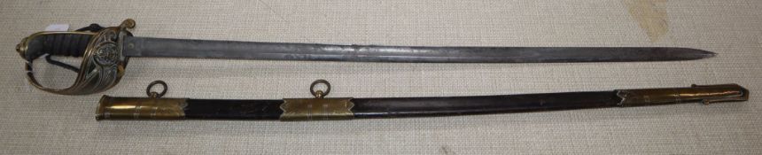 An early 20th century Naval officer's dress sword, etched blade