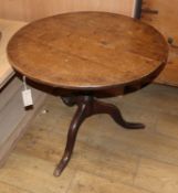 A George III circular oak tea table (reduced) Diam.69cm