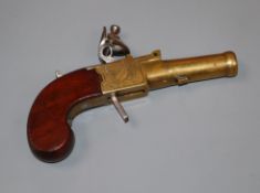 A brass barrelled pocket pistol