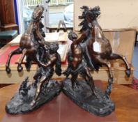After Costou. A pair of bronze Marly horse groups height 54cm