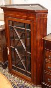 An inlaid mahogany hanging corner cabinet W.80cm