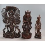 Three Balinese hardwood carvings tallest 31cm