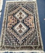 A Caucasian design geometric rug 124 x 84cm