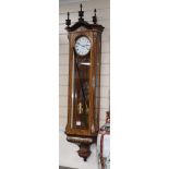 A 19th century and later rosewood, cut pewter and brass Vienna style regulator wall clock H.140cm