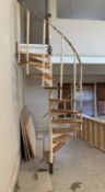 A sectional metal and timber spiral staircase