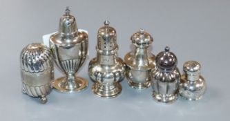 Six assorted early 20th century and later silver condiments.