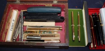 A collection of Cartier, Mont Blanc, Parker, Cross and other pens