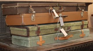 Three Victorian and later leather and canvas gun cases