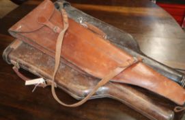 Three vintage leather gun cases