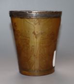 A 19th century white metal mounted horn beaker carved with the crucifixion height 10cm