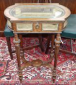 A late 19th century French Louis XV style walnut kidney-shaped bijouterie table with gilt metal