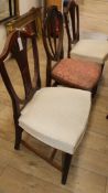 A pair of George III fruitwood chairs and a Hepplewhite style chair