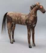 A carved wood horse height 53cm.