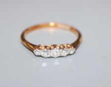 An 18ct & pt, five stone diamond ring, size N.