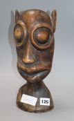 A tribal carved hardwood bust height 30cm