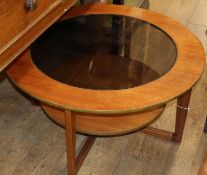 A mid century teak glass top coffee table Diam.84cm