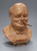 A mid 20th century composition table lighter, modelled as Churchill, signed Tallent height 21cm