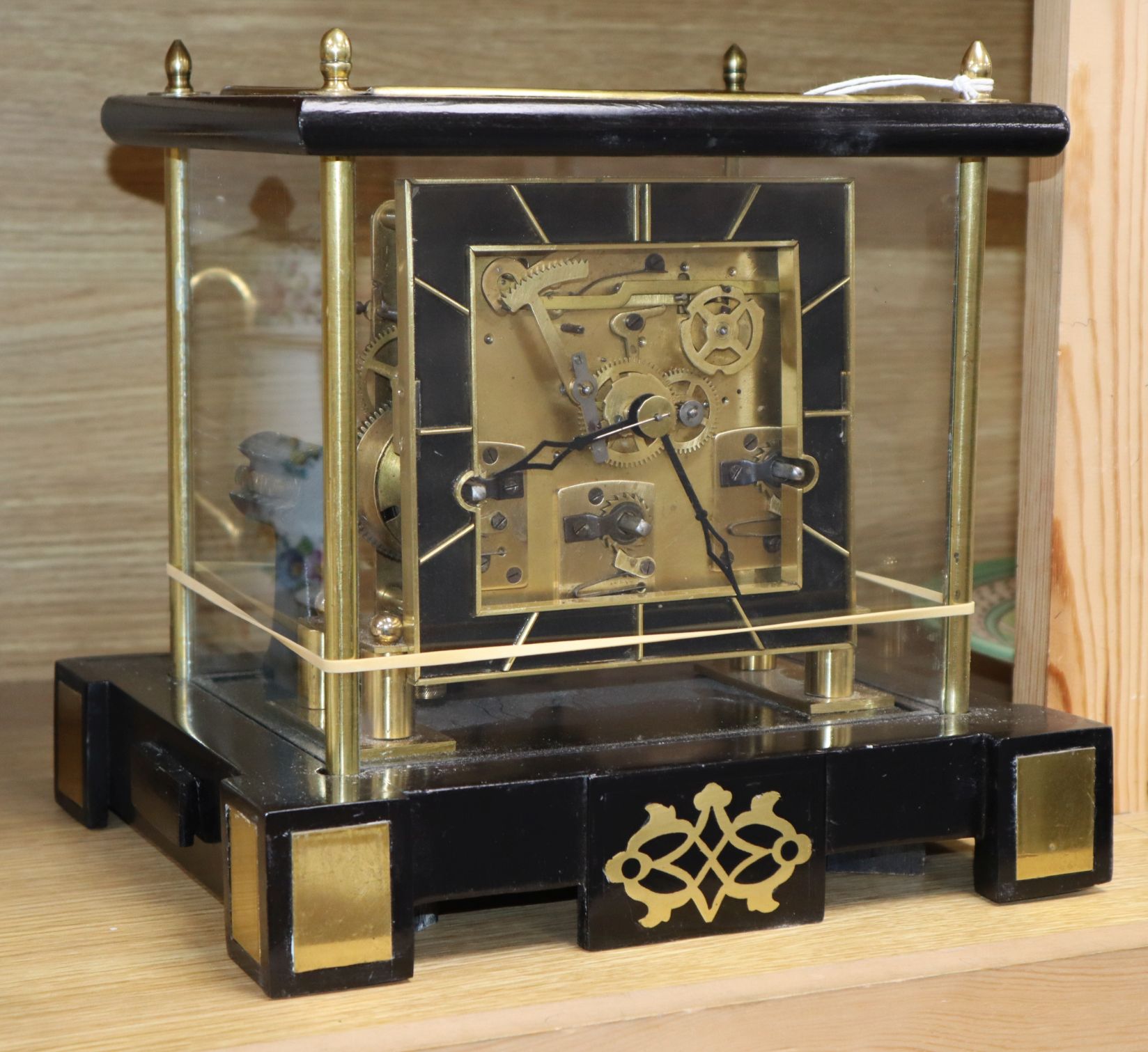 A glass and brass chiming mantel clock height 26cm