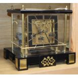 A glass and brass chiming mantel clock height 26cm