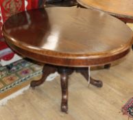 A late Victorian oak loo table W.130cm