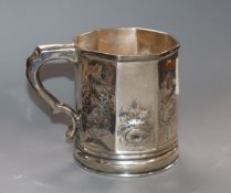 A 19th century American embossed white metal christening mug by Gale, Wood and Hughes? (a.f.),